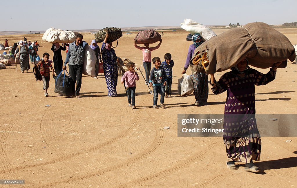 Refugees Flee Kobane As IS Forces Battle Kurdish Resistance
