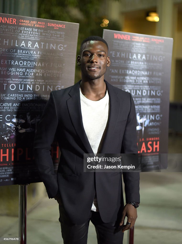 Actor Kofi Siriboe attends the premiere of "Whiplash" at Bing Theatre