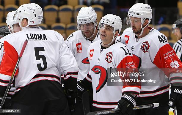 Mikko Luoma of JYP Jyvaskyla and Eric Perrin of JYP Jyvaskyla celebrates after Eric scored 1-0 during the Champions Hockey League group stage game...