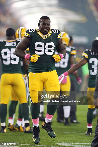Letroy Guion of the Green Bay Packers takes the field during player introductions before the NFL game against the Minnesota Vikings on October 02,...