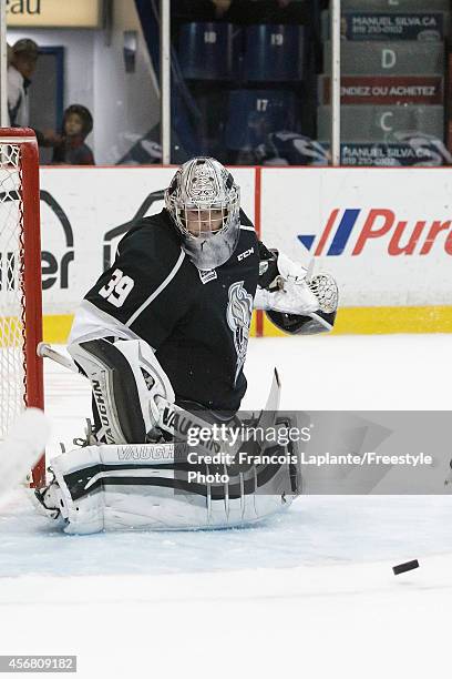 Anthony Brodeur of the Gatineau Olympiques guards his net against the Cape Breton Screaming Eagles on September 25, 2014 at Robert Guertin Arena in...