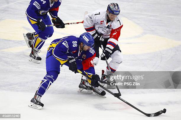 Balastik Jaroslav of PSG Zlin, # 7 Hoerdler Frank, HC Eisbren Berlin during the Champions Hockey League group stage game between PSG Zlin and...