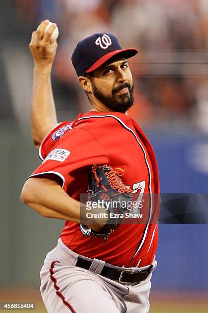 Gio Gonzalez of the Washington Nationals pitches in the first inning against the San Francisco Giants during Game Four of the National League...
