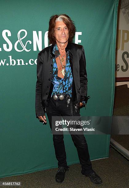 Guitarist Joe Perry of Aerosmith promotes his book "Rocks: My life in and out of Aerosmith" at Barnes & Noble Union Square on October 7, 2014 in New...