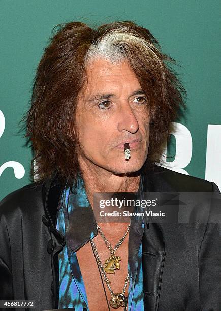 Guitarist Joe Perry of Aerosmith promotes his book "Rocks: My life in and out of Aerosmith" at Barnes & Noble Union Square on October 7, 2014 in New...