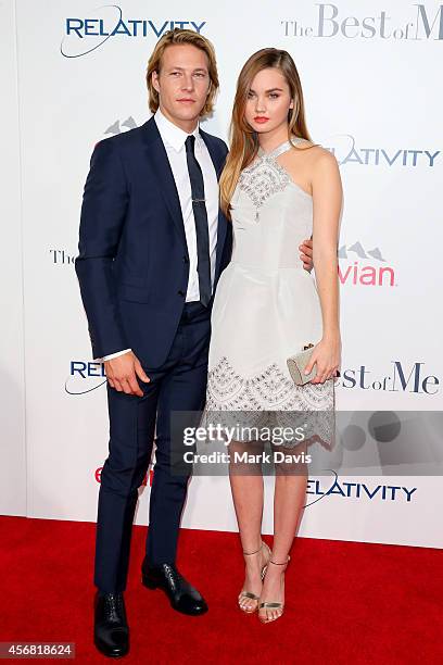 Actors Luke Bracey and Liana Liberato attend the premiere of Relativity Studios' "The Best Of Me" at Regal Cinemas L.A. Live on October 7, 2014 in...