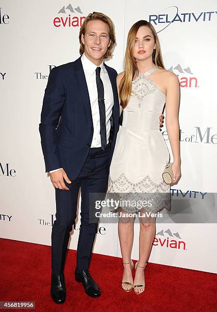 Actor Luke Bracey and actress Liana Liberato attend the premiere of "The Best Of Me" at Regal Cinemas L.A. Live on October 7, 2014 in Los Angeles,...