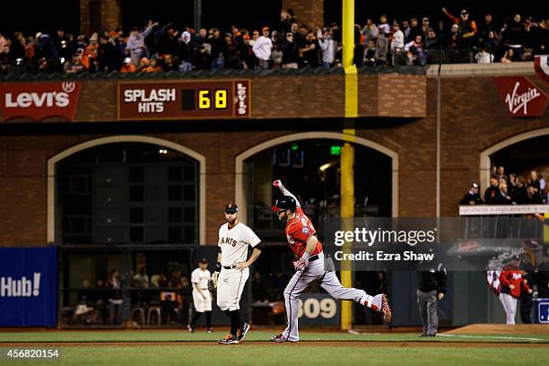 Bryce Harper of the Washington Nationals celebrates as he rounds the bases on his solo home run in the seventh inning against the San Francisco...