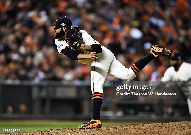 Sergio Romo of the San Francisco Giants pitches in the eighth inning against the Washington Nationals during Game Four of the National League...