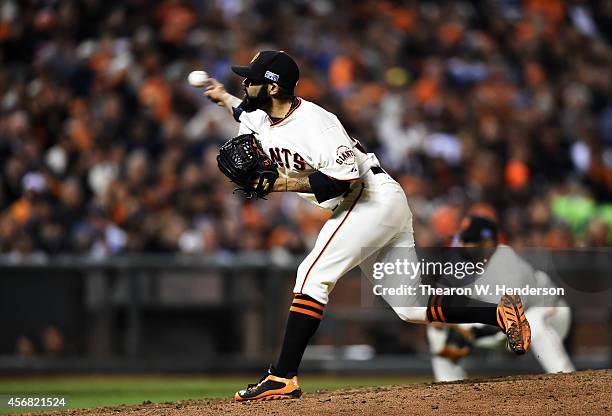 Sergio Romo of the San Francisco Giants pitches in the eighth inning against the Washington Nationals during Game Four of the National League...