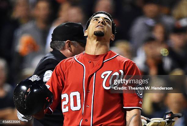 Ian Desmond of the Washington Nationals reacts as he strikes out in the ninth inning against the San Francisco Giants during Game Four of the...