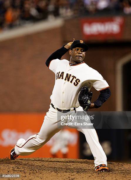 Santiago Casilla of the San Francisco Giants pitches in the ninth inning against the Washington Nationals during Game Four of the National League...