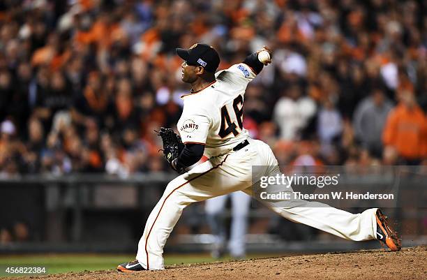 Santiago Casilla of the San Francisco Giants pitches in the ninth inning against the Washington Nationals during Game Four of the National League...