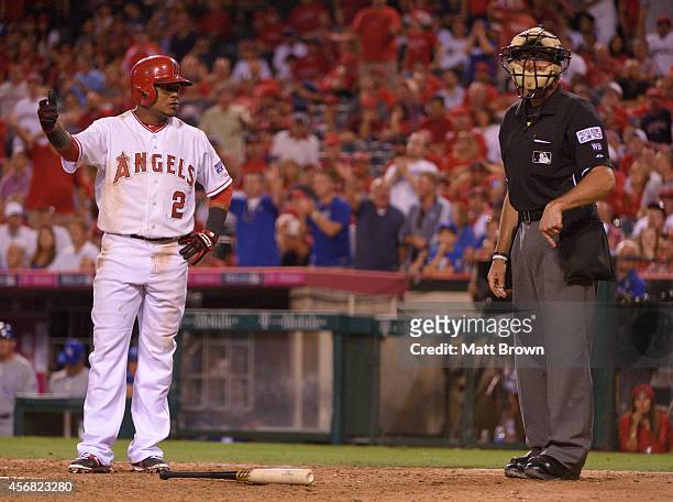 Erick Aybar of the Los Angeles Angels of Anaheim argues with an umpire during the game against the Kansas City Royals during Game One of the American...
