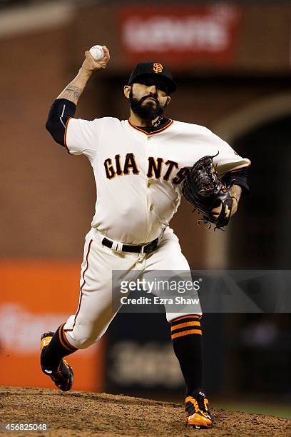 Sergio Romo of the San Francisco Giants pitches in the eighth inning against the Washington Nationals during Game Four of the National League...