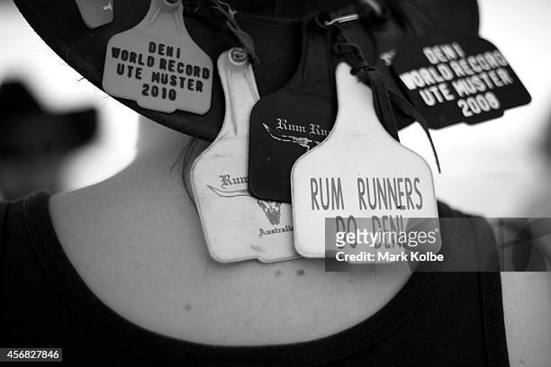 Festival goer's hat tags are seen on the first day on the second day of the 2014 Deni Ute Muster at the Play on the Plains Festival ground on October...