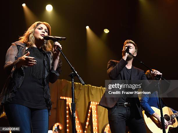 Singer Hillary Scott and Charles Kelley of Lady Antebellum perform at the premiere of Relativity Studios' "The Best Of Me" after party featuring a...