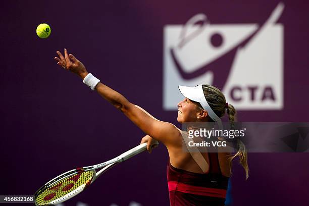 Andrea Hlavackova of the Czech Republic serves in her match against Sorana Cirstea of Romania during day three of the WTA Tianjin Open at Tianjin...