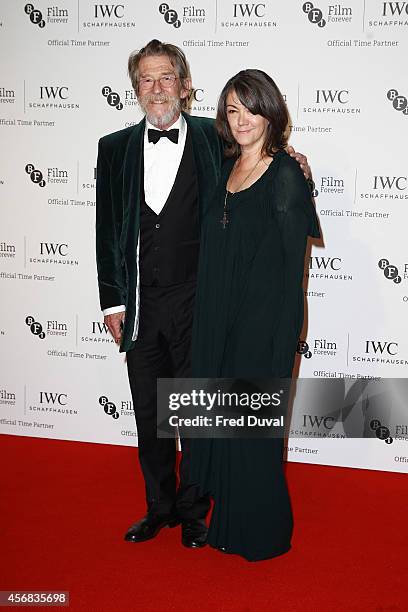 John Hurt and Ann Rees Meyers attends the IWC gala dinner in honour of the BFI during the BFI London Film Festival at Battersea Evolution on October...