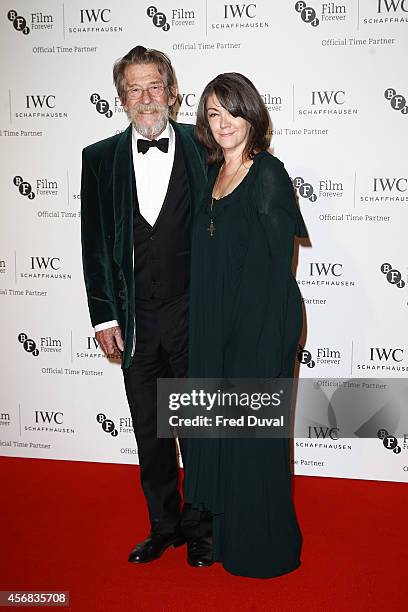 John Hurt and Ann Rees Meyers attends the IWC gala dinner in honour of the BFI during the BFI London Film Festival at Battersea Evolution on October...