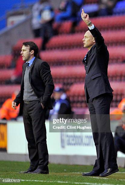 Uwe Rosler manager of Wigan Athletic and Dougie Freedman manager of Bolton Wanderers during the Sky Bet Championship match between Wigan Athletic and...