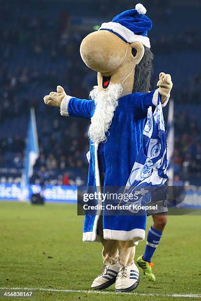 Mascot Erwin of Schalke celebrate after the Bundesliga match between FC Schalke 04 and SC Freiburg at Veltins-Arena on December 15, 2013 in...