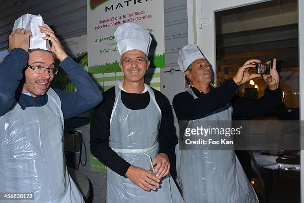 Aurelien Busso, Alain Roche and Pierre Coussin attend the'Tee Break Gourmand' Auction Golf Competition hosted by Matrix to benefit SOS Gazelles at...