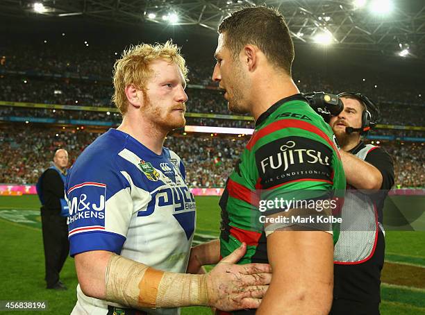 James Graham of the Bulldogs and Sam Burgess of the Rabbitohs speak at the end of the 2014 NRL Grand Final match between the South Sydney Rabbitohs...