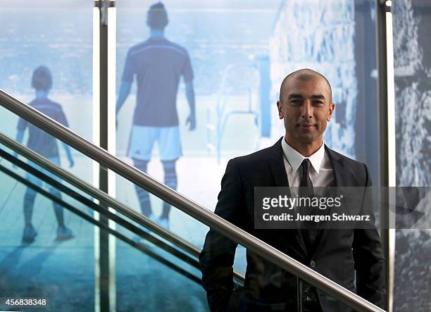 Roberto Di Matteo, the newly appointed head coach of FC Schalke 04, arrives for a press conference at Veltins-Arena on October 8, 2014 in...