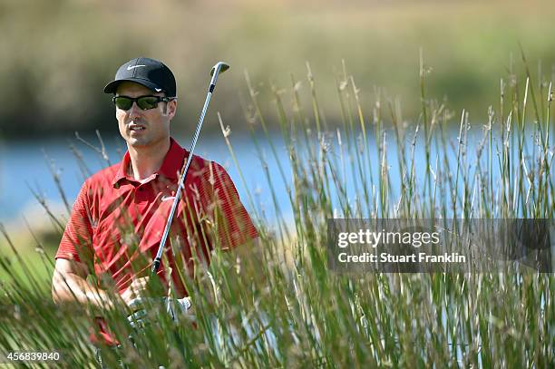 Ross Fisher of England plays a shot during the pro - am prior to the start of the Portugal Masters at Oceanico Victoria Golf Club on October 8, 2014...