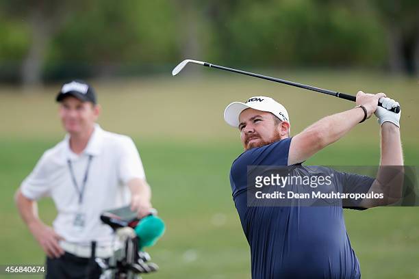 Shane Lowry of Ireland hits his second shot on the 18th hole during the Portugal Masters ProAm held at the Oceanico Victoria Golf Course on October...