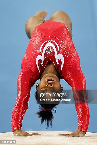 Simone Biles of the United States performs on the Balance Beam during the Women's Team Final on day two of the 45th Artistic Gymnastics World...