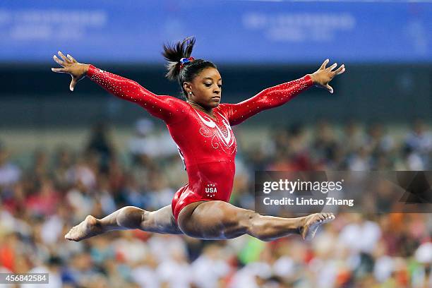 Simone Biles of the United States performs on the Balance Beam during the Women's Team Final on day two of the 45th Artistic Gymnastics World...