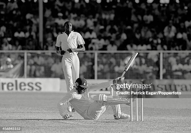 Curtly Ambrose unsettles Devon Malcolm with a bouncer, having bowled him with a no ball, 4th Test West Indies v England at Bridgetown 1989-90.