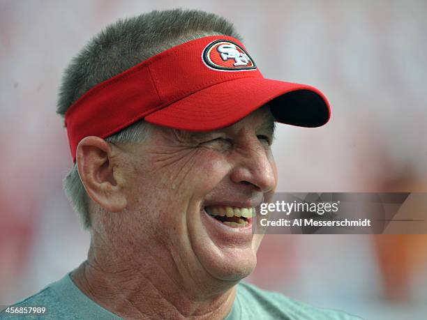 Linebacker coach Jim Leavitt of the San Francisco 49ers watchs warmups against the Tampa Bay Buccaneers December 15, 2013 at Raymond James Stadium in...