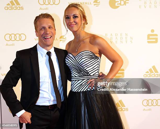 Sabine Lisicki attends with Oliver Pocher the Sportler des Jahres 2013 gala at the Kurhaus Baden-Baden on December 15, 2013 in Baden-Baden, Germany.