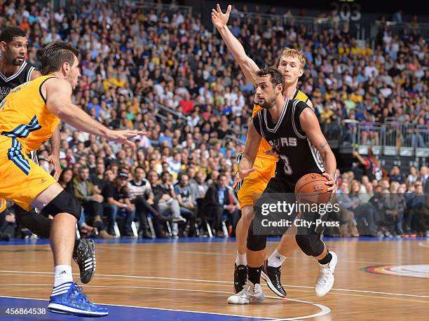 Tim Duncan of San Antonio Spurs, Marko Banic of ALBA Berlin, Marco Belinelli of San Antonio Spurs and Niels Giffey of ALBA Berlin during the NBA...