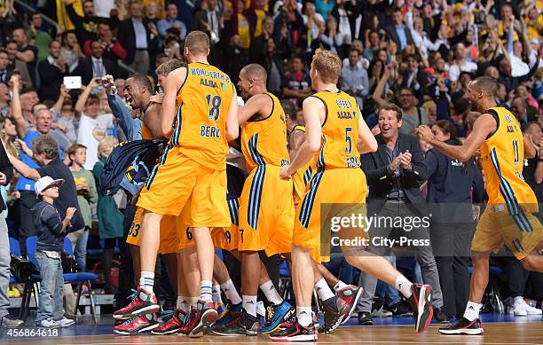 Alba players celebrate during the NBA Global Games Tour 2014 match between Alba Berlin and San Antonio Spurs at O2 World on October 8, 2014 in...