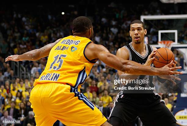 Danny Green of San Antonio is challenged by Reggie Redding of Berlin during the NBA Global Games Tour 2014 match between Alba Berlin and San Antonio...