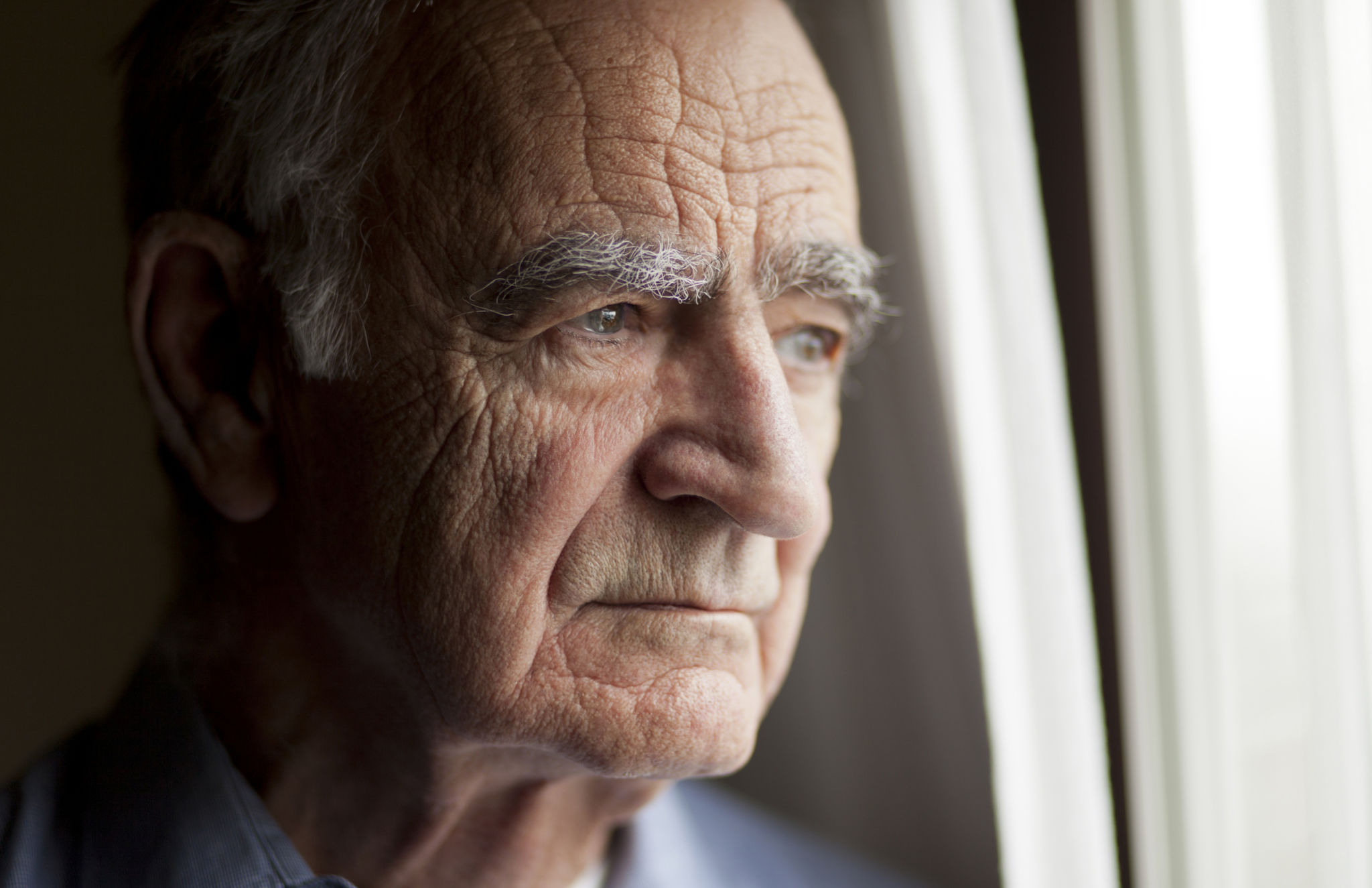Portrait of Elderly man lost in thought Portrait of Elderly man lost in thought