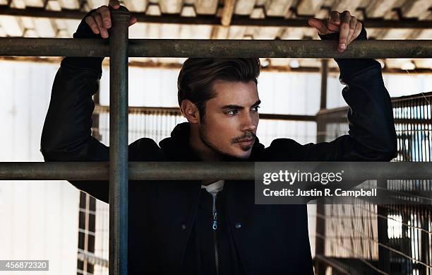 Actor Josh Henderson is photographed for Just Jared on August 13, 2014 in Los Angeles, California.