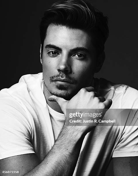 Actor Josh Henderson is photographed for Just Jared on August 13, 2014 in Los Angeles, California.