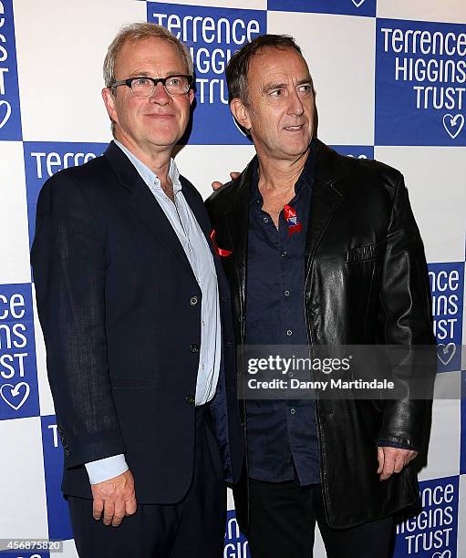 Harry Enfield and Angus Deayton attends The Terrance Higgins Supper Club at Underglobe on October 8, 2014 in London, England.