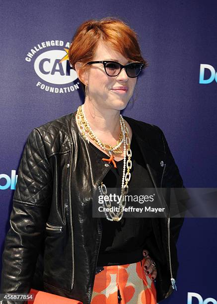 Actress Molly Ringwald arrives at the Los Angeles premiere of 'Dolphin Tale 2' at Regency Village Theatre on September 7, 2014 in Westwood,...