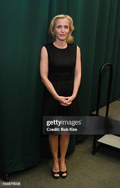 Gillian Anderson attends Gillian Anderson In Conversation With Jeff Rovin to promote new book "A Vision of Fire" at Barnes & Noble Tribeca on October...