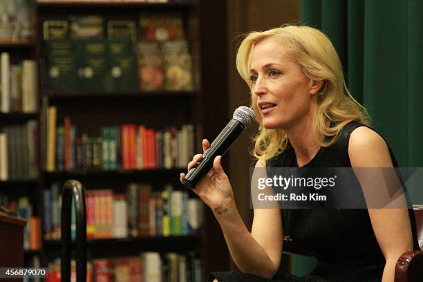 Gillian Anderson attends Gillian Anderson In Conversation With Jeff Rovin to promote new book "A Vision of Fire" at Barnes & Noble Tribeca on October...