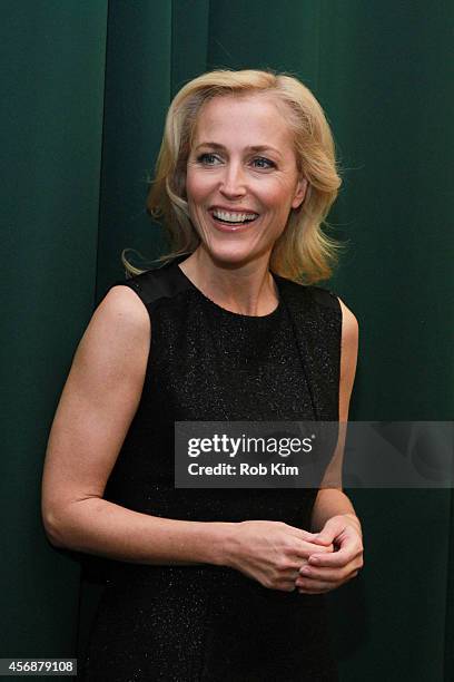 Gillian Anderson attends Gillian Anderson In Conversation With Jeff Rovin to promote new book "A Vision of Fire" at Barnes & Noble Tribeca on October...