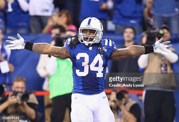 Trent Richardson of the Indianapolis Colts celebrates after scoring a touchdown during the NFL game against the Houston Texans at Lucas Oil Stadium...