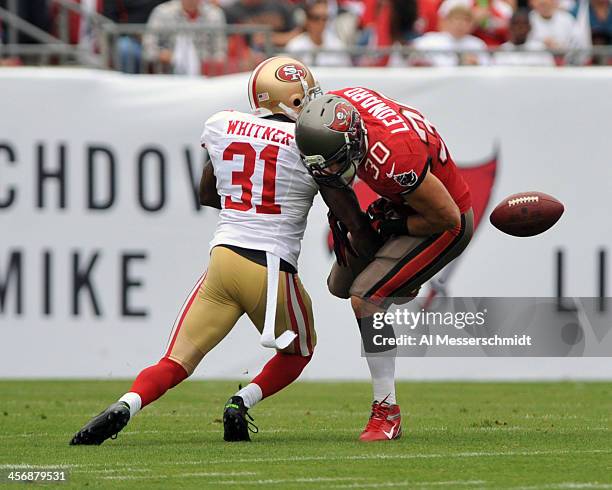 Running back Brian Leonard of the Tampa Bay Buccaneers drops a 1st quarter pass against Donte Whitner of the San Francisco 49ers December15, 2013 at...