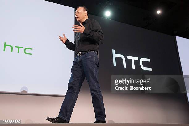 Peter Chou, chief executive officer of HTC Corp., speaks during an unveiling event in New York, U.S., on Wednesday, Oct. 8, 2014. HTC released the Re...